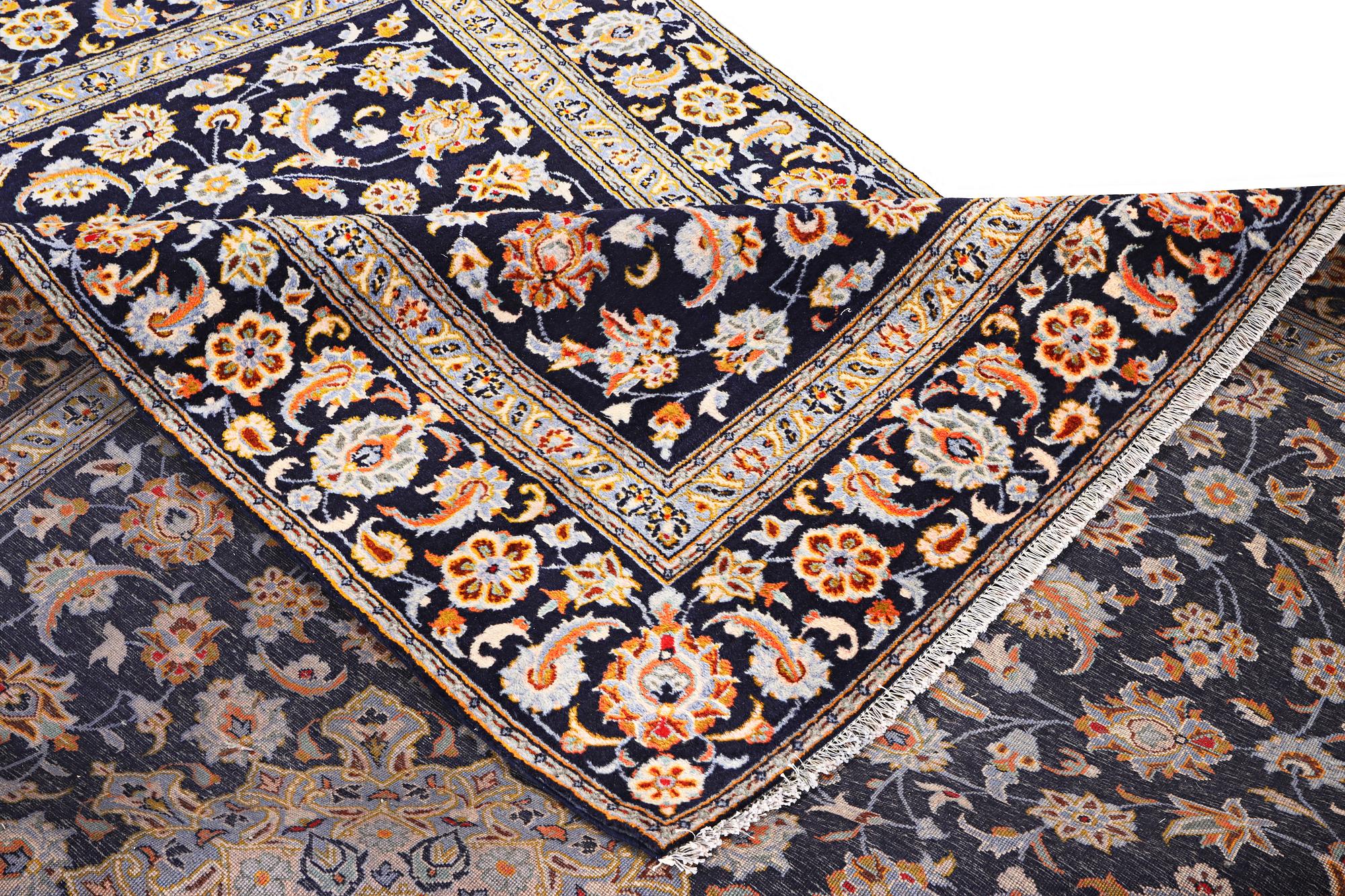 A Kashan carpet, c. 335 x 224 cm.
