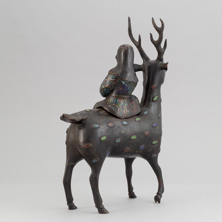 A bronze and enamel cencer in the shape of Shoulao on his deer, late qing dynasty 19th/20th century.