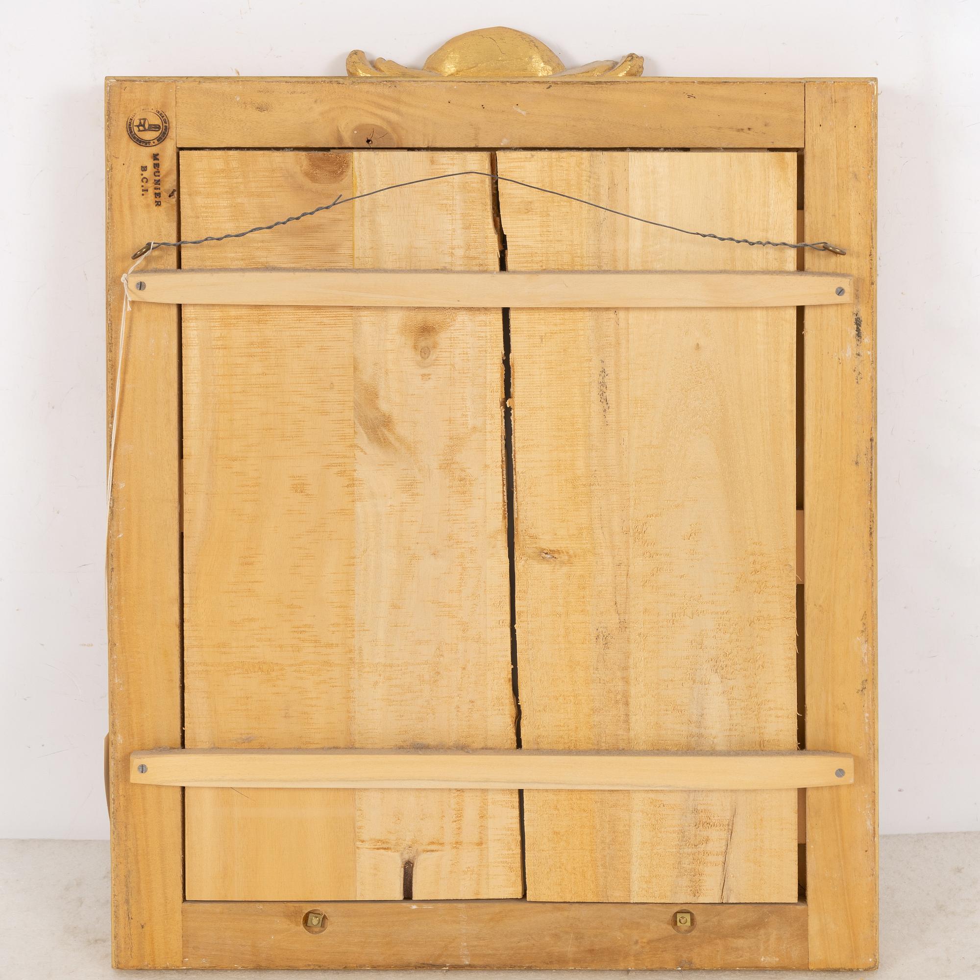 A "Meunier" mirror wall lamp from IKEA's 18th-century series, late 20th century.