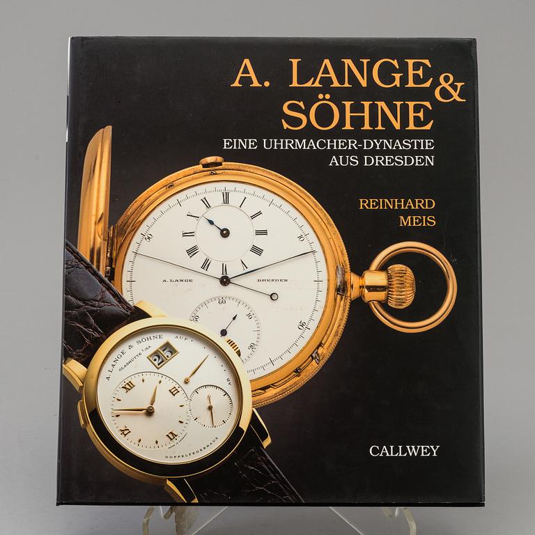 A set of 5 watch books.