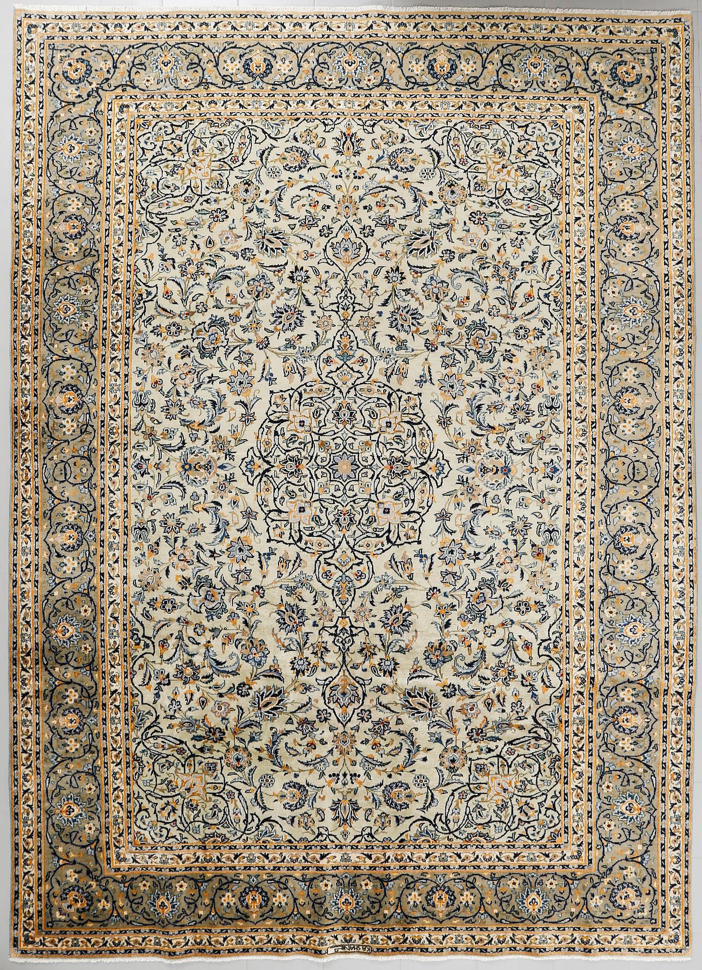 A Keshan rug, signed, ca 370 x 268 cm.