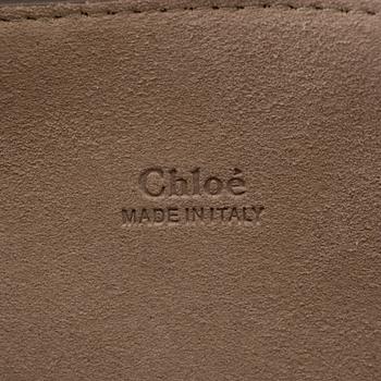 A Chloé "Faye" handbag with imitation leopard.