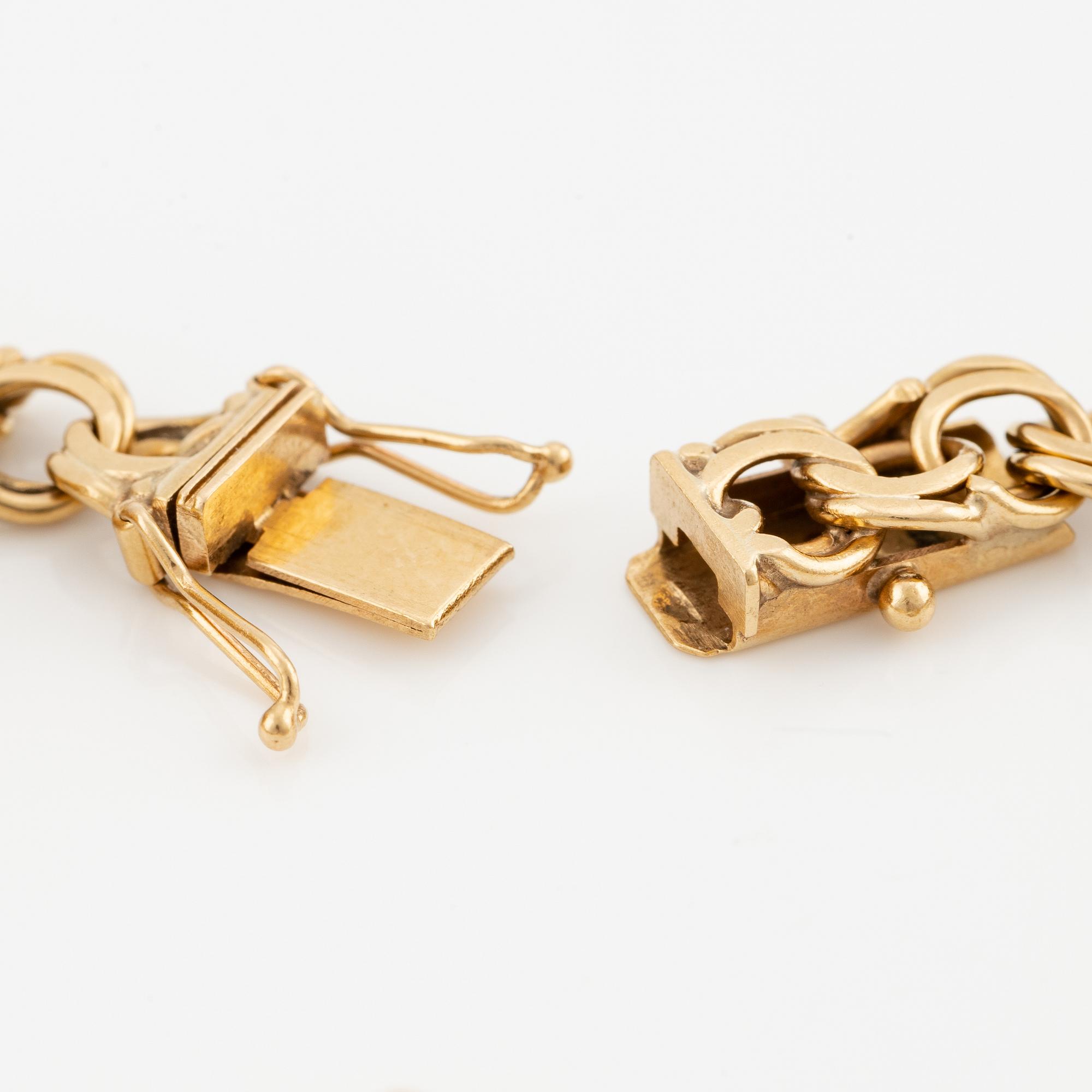 Armband 18K guld, med berlocker.