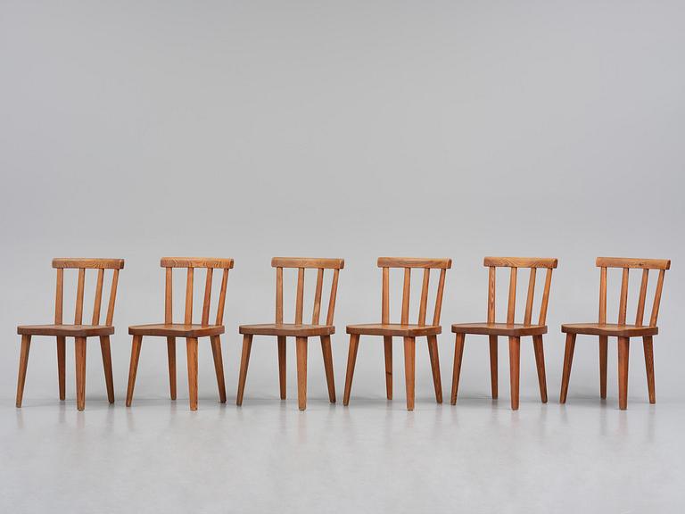 Axel Einar Hjorth, a set of six stained pine "Utö" chairs, Nordiska Kompaniet, Sweden, 1930s.
