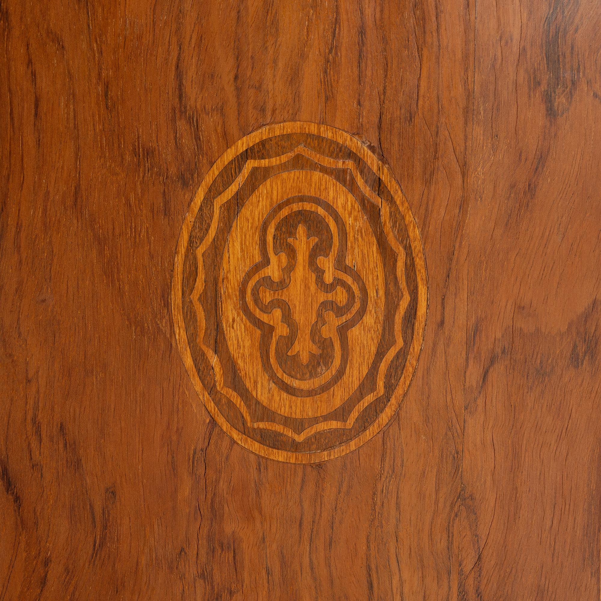 A small cabinet with drawers from around the year 1900.