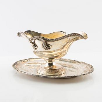 Sauceboat on tray, silver, first half of the 20th century.