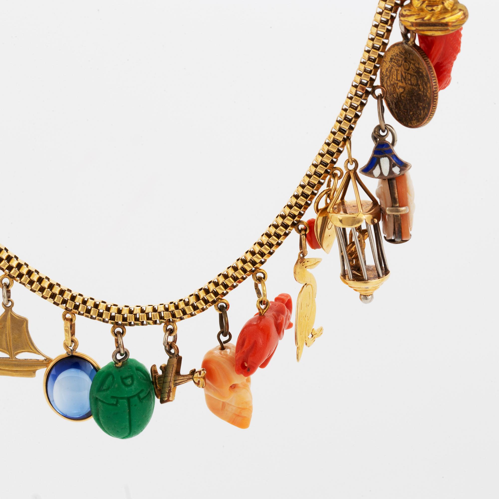 18K gold necklace with charms.