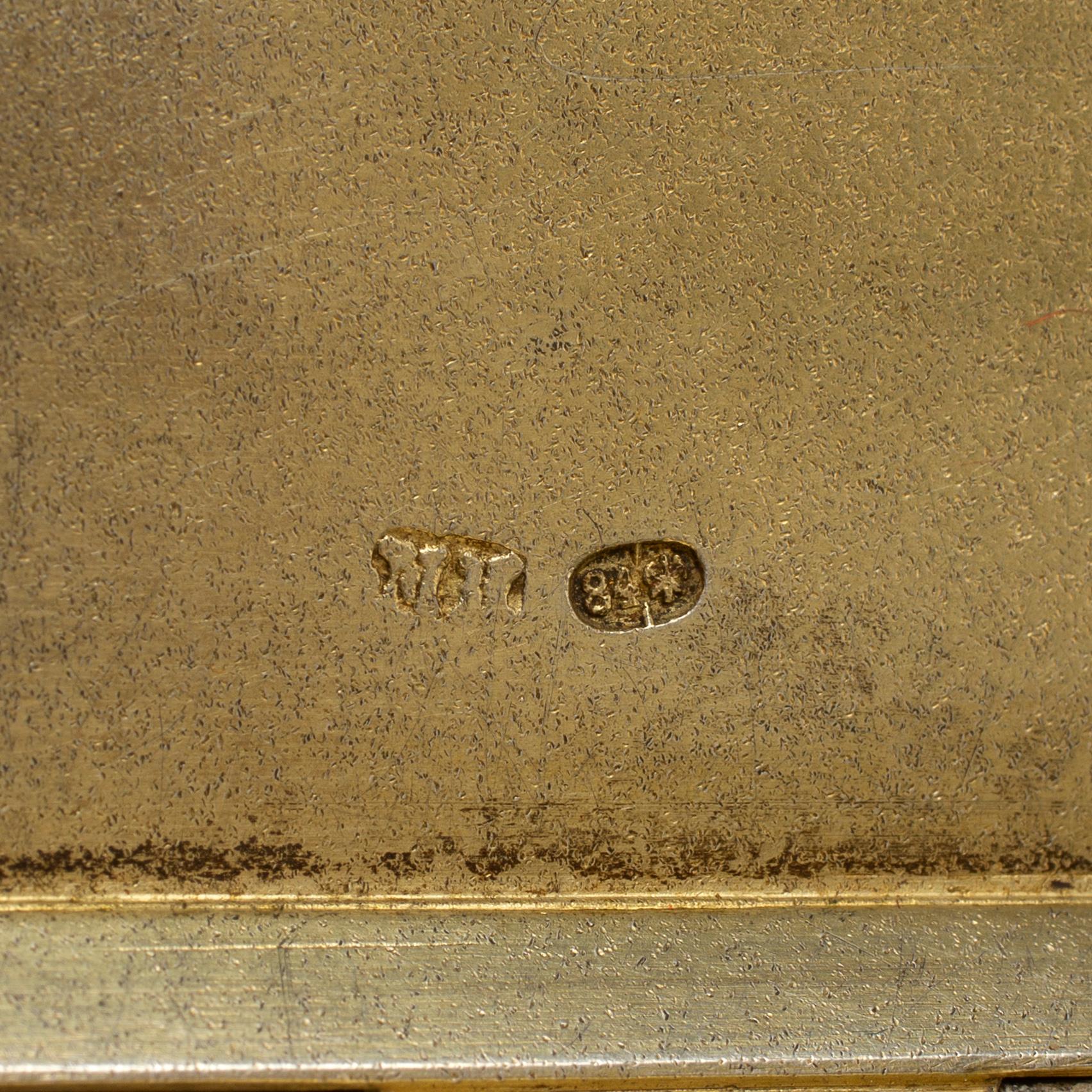 A Russian late 19th century parcel-gilt silver cigarette-case, unidentified makers mark, St. Petersburg.