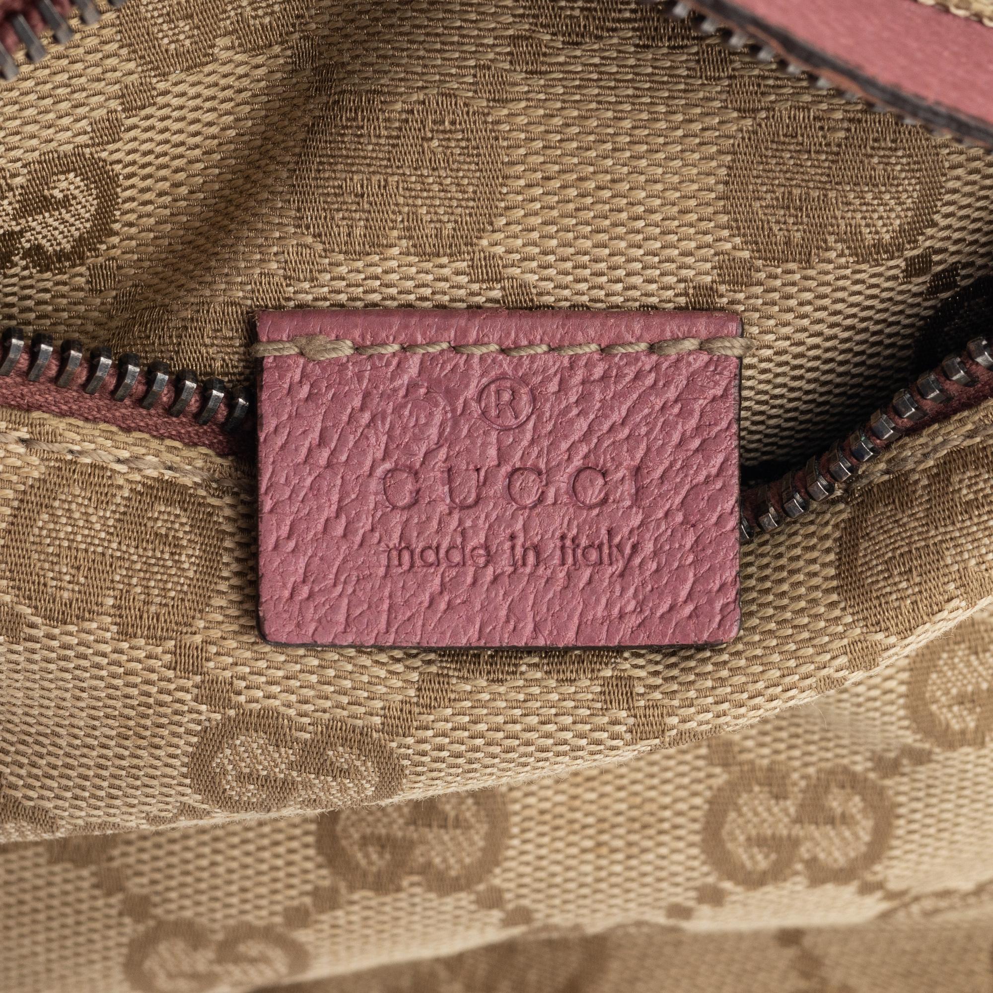 Gucci, a canvas beltbag.