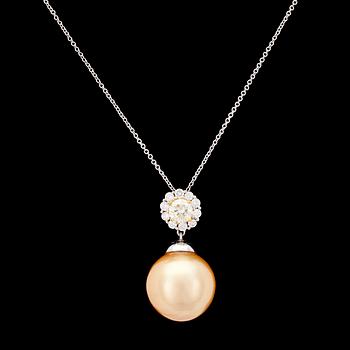 1156. A cultured golden South sea pearl, 15 mm, and brilliant cut diamond pendant.