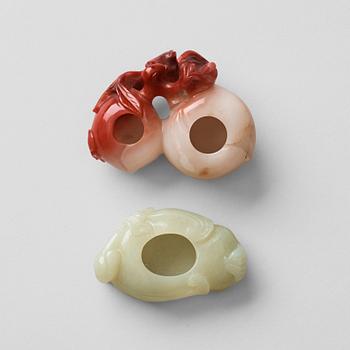 497. Two carved brush washers in nephrite and calcedon, Qing dynasty (1664-1912).
