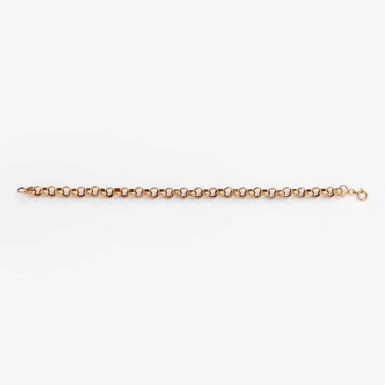 A 14K gold bracelet.
