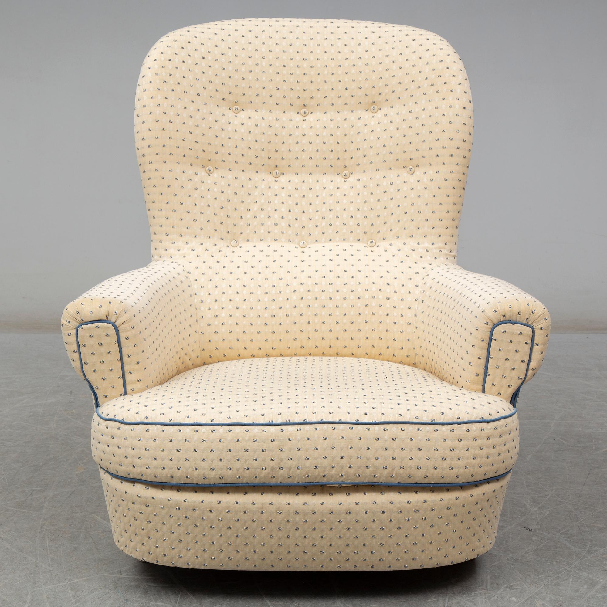 A Carl Malmsten "Jättepaddan" armchair, late 20th or early 21th century.