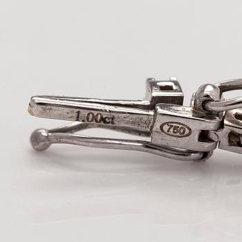 Tennisarmband, 18K vitguld och briljantslipade diamanter.