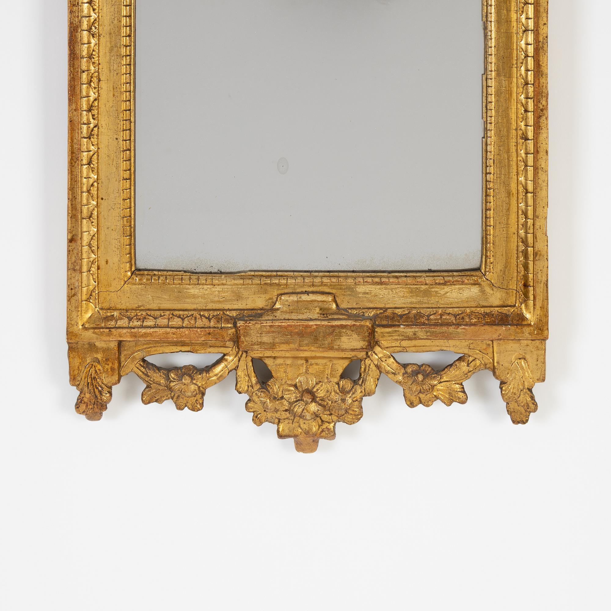A Gustavian mirror by Johan Åkerblad, master in Stockholm 1758-99), signed.