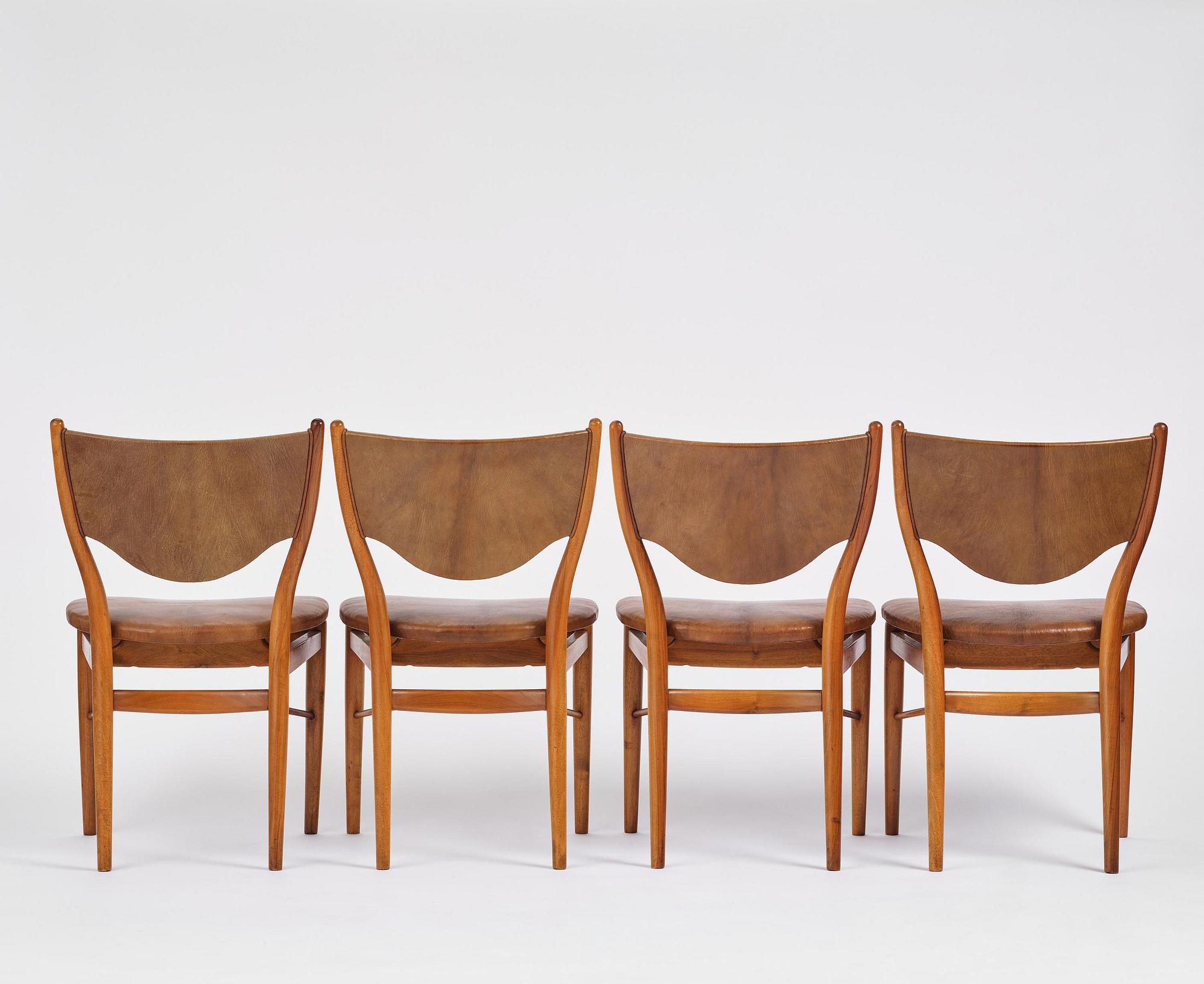 Finn Juhl, a set of four chairs and a pair of armchairs, model "Bo-63" and "Bo-72", Bovirke, Denmark, 1950s-60s.