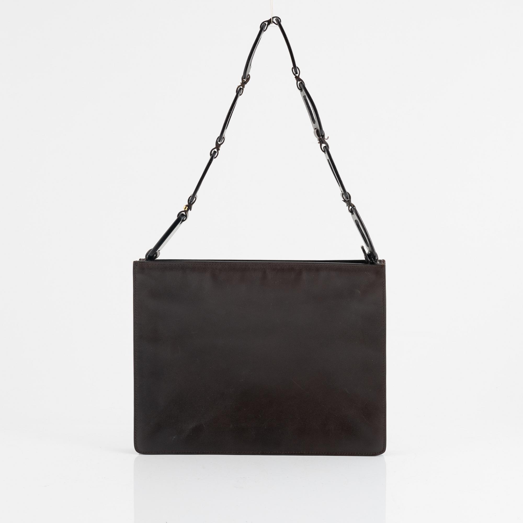 Gucci, a handbag.