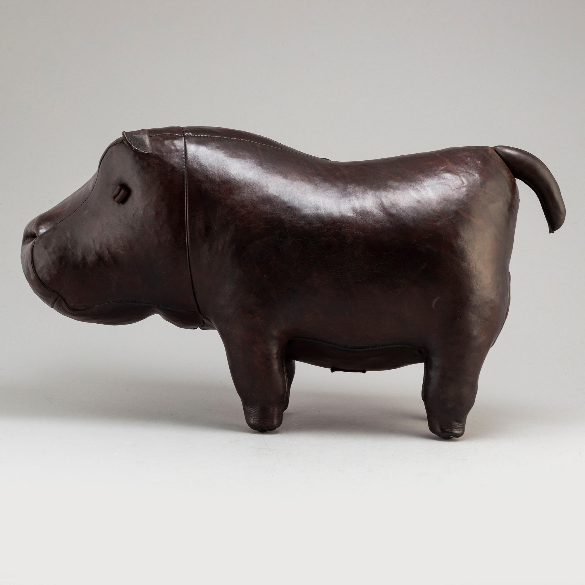 A leather footstool by Dimitri Omersa & Co.