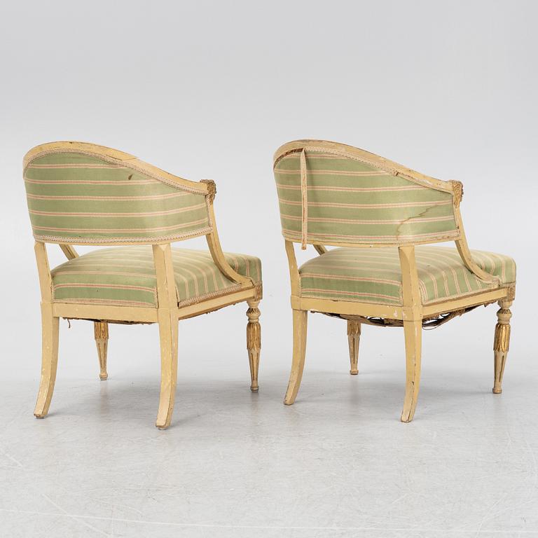 A matched pair of Gustavian style armchairs. One from around the year 1800 and one from around the year 1900.
