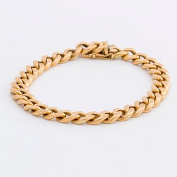ARMBAND 18K guld pansarlänk, 57,0 g,  Jo-Ans Guld Köping 1978.
