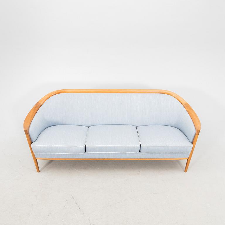 Bertil Fridhagen, a 1960s walnut sofa and armchair Bröderna Andersson.