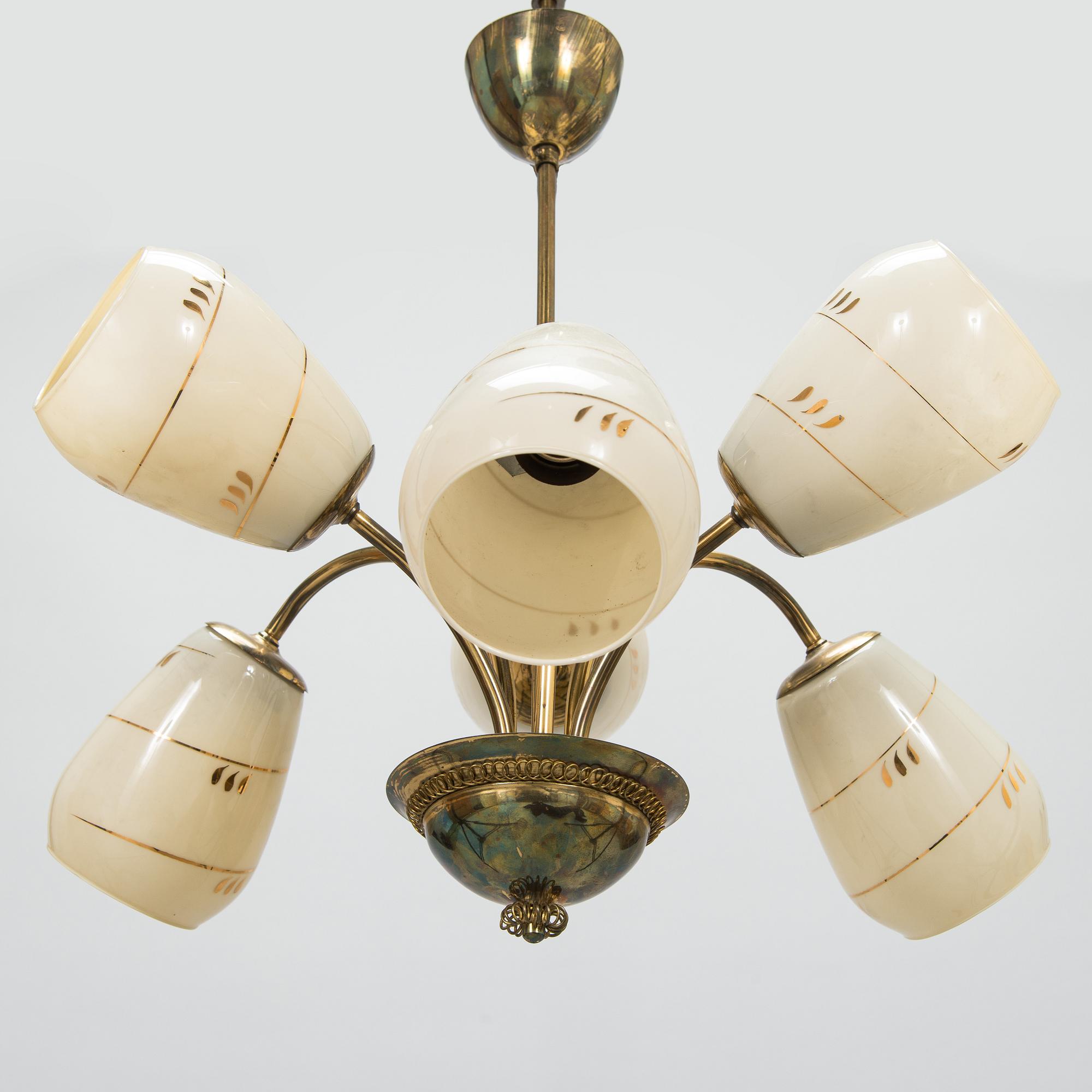 A mid-20th-century brass ceiling light, Finland.
