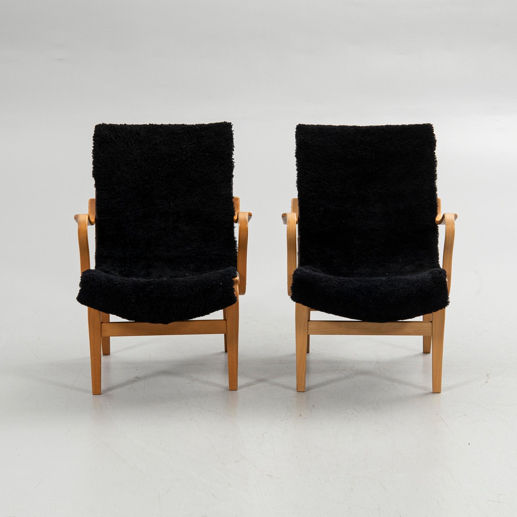 Bruno Mathsson, armchairs, a pair, "Eva", Bruno Mathsson International, Värnamo, second half of the 20th century.