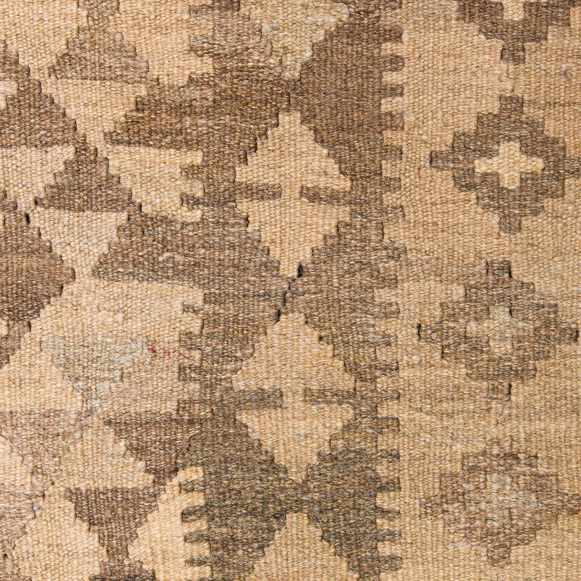 A Kilim carpet, ca. 305 x 196 cm.