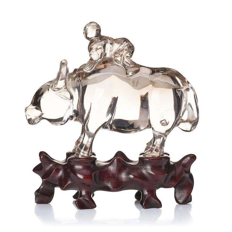 A rock chrystal sculpture of a boy on a buffalo, Qing dynasty, 19th century.