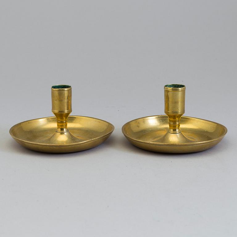 A pair of Swedish 18th century travelling brass candlesticks.