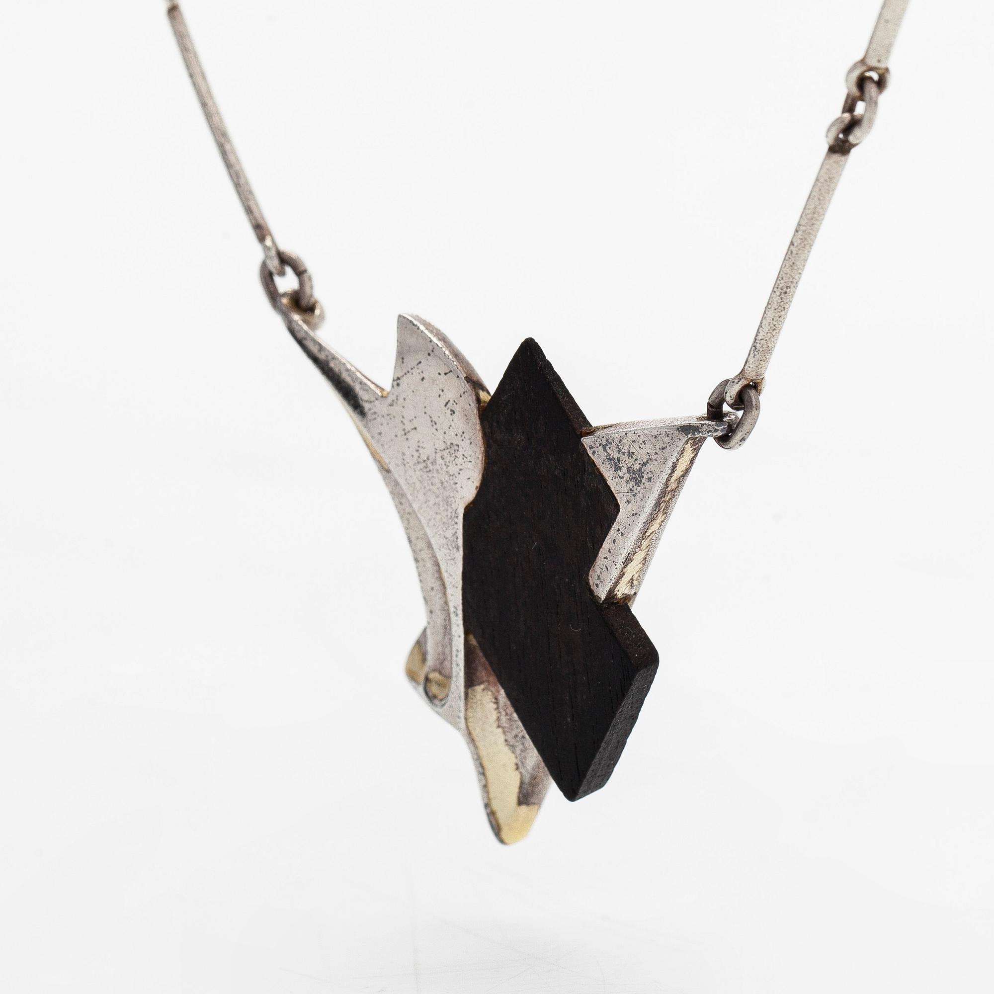 Zoltan Popovits, a sterling silver and ebony necklace and earrings, Lapponia 1985.