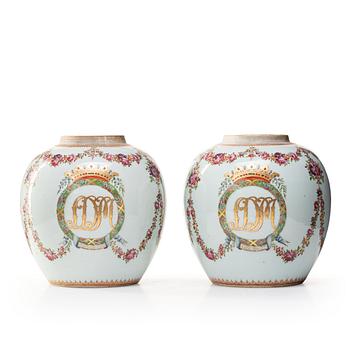 718. A pair of famille rose jars, Qing dynasty, Qianlong (1736-95).