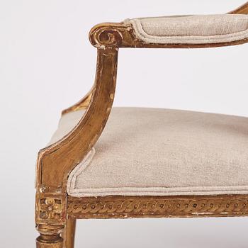 A near pair of Gustavian giltwood fauteuils, Stockholm, late 18th century.