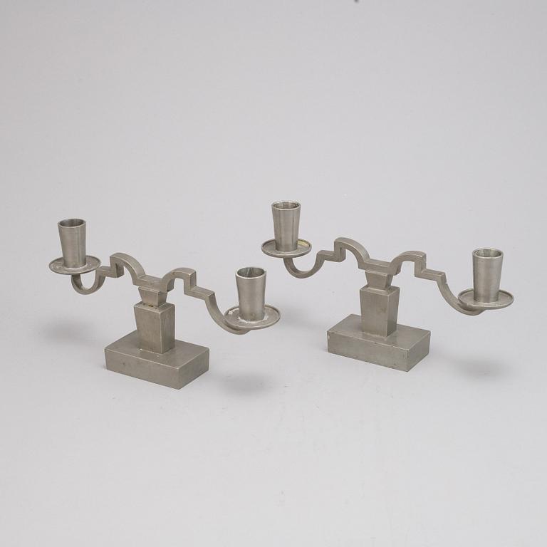 Nils Fougstedt, A pair of pewter candle sticks for Firma Svenskt Tenn, 1933.