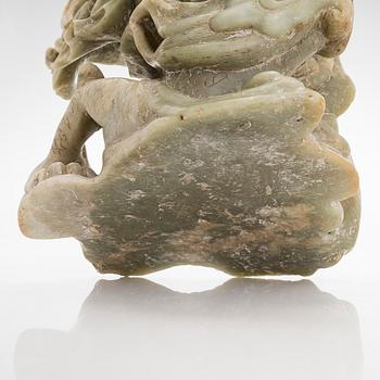 A large soapstone sculpture group of Guanyin, 20th century.