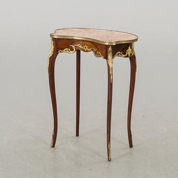 A NEO ROCOCO SIDE TABLE.