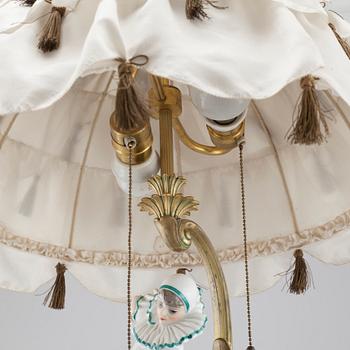 A table lamp with a porcelain figurine by Rosenthal, first half of the 20th century.