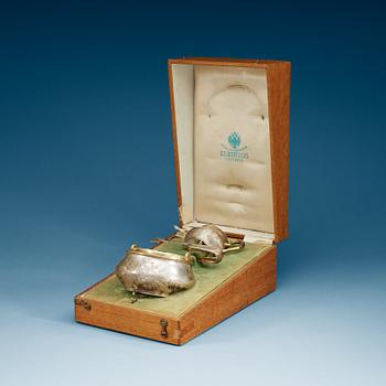 A Russian early 20th century cream and sugar set, marks of Alexander Fulid, Moscow and Karl Selenius, St. Petersburg.