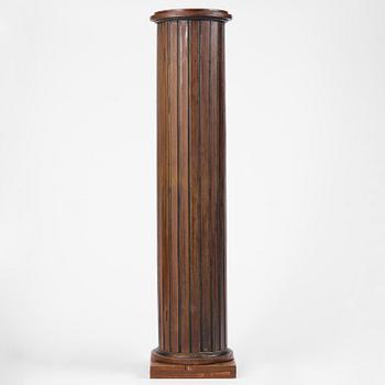 A Swedish Empire column-shaped cabinet, first part 19th century.