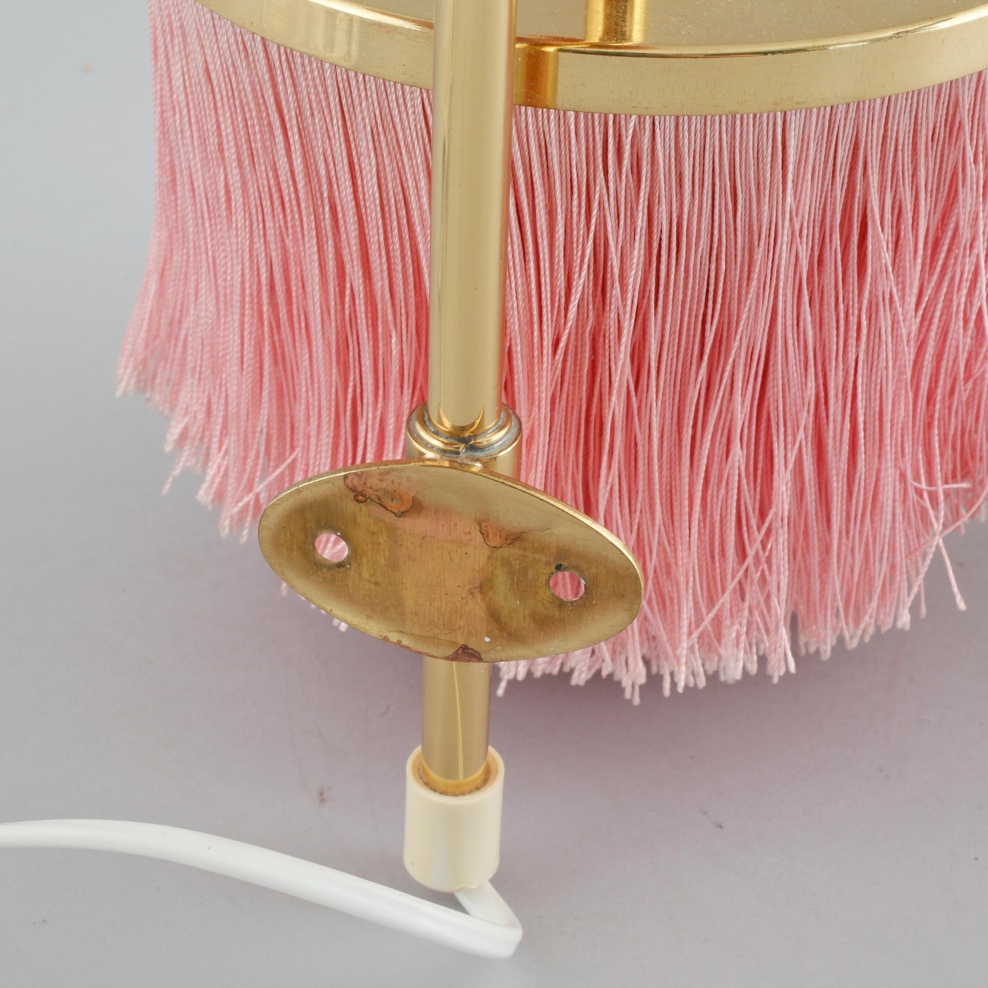 A pair of wall lamps by Hans-Agne Jakobsson for Markaryd from the second half of the 20th century.