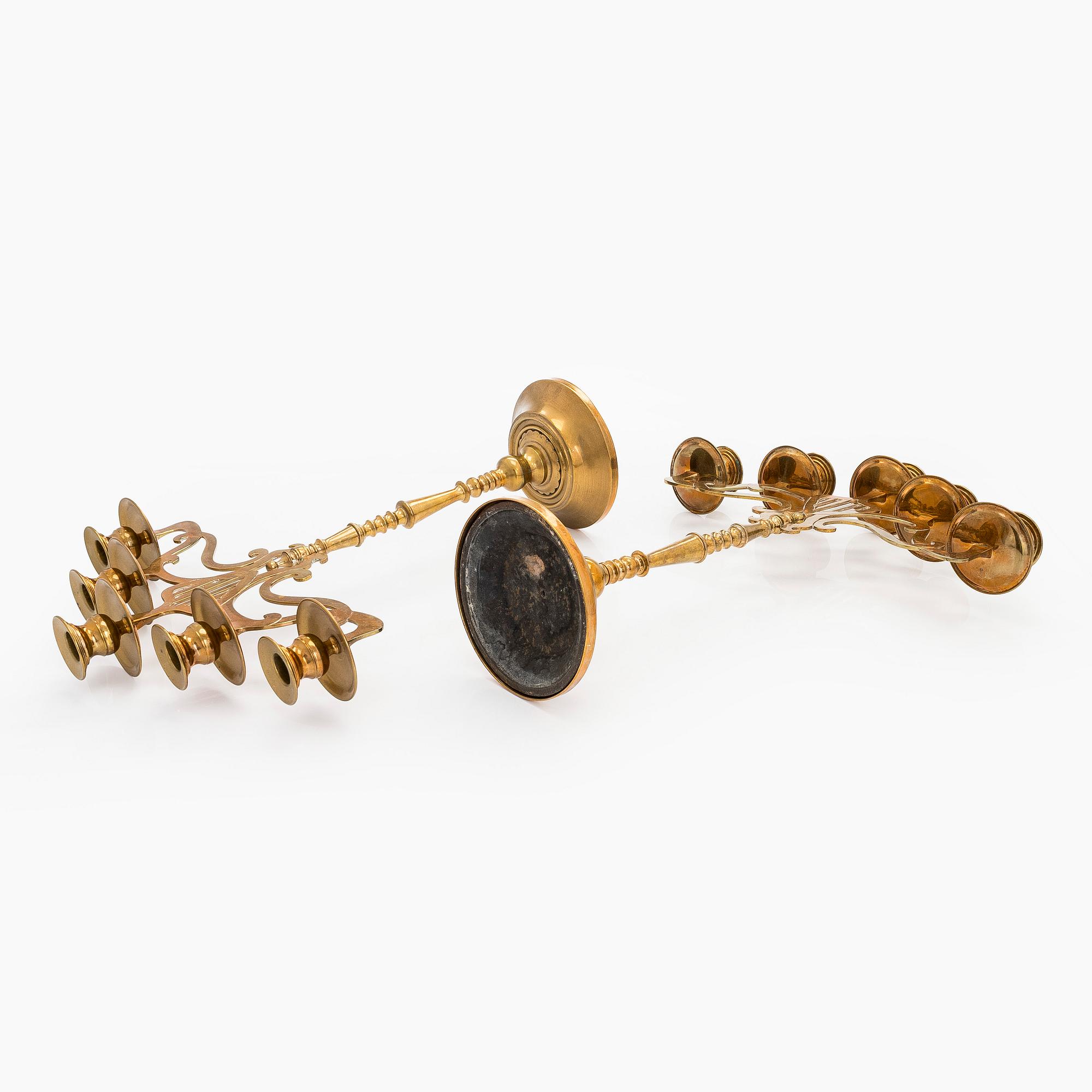 A pair of brass candelabras, early 20th century.