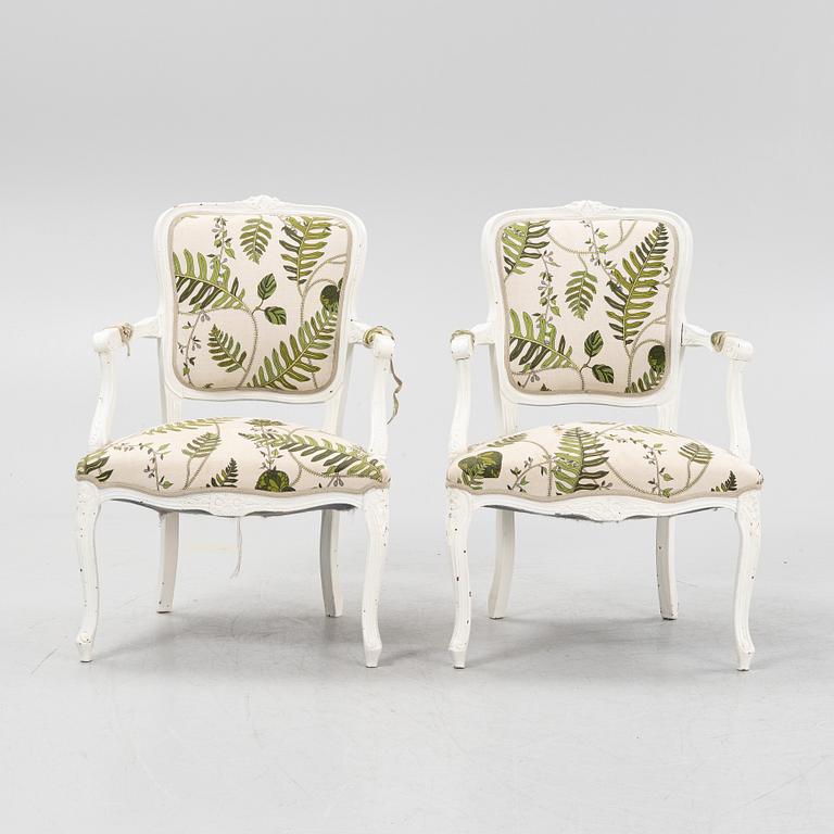 A pair of Rococo style armchairs, 20th century.