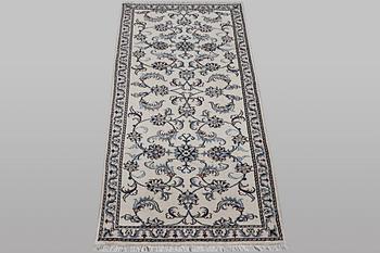 A runner carpet, Nain, part silk, ca 192 x 80 cm.