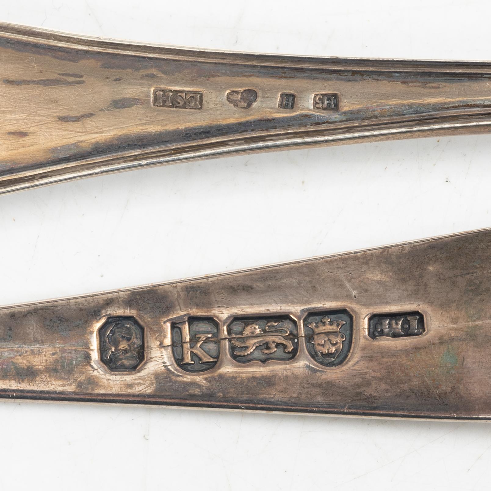 Two pierced silver bowls and two sugar spoons, including Sweden and Endland, 20th century.