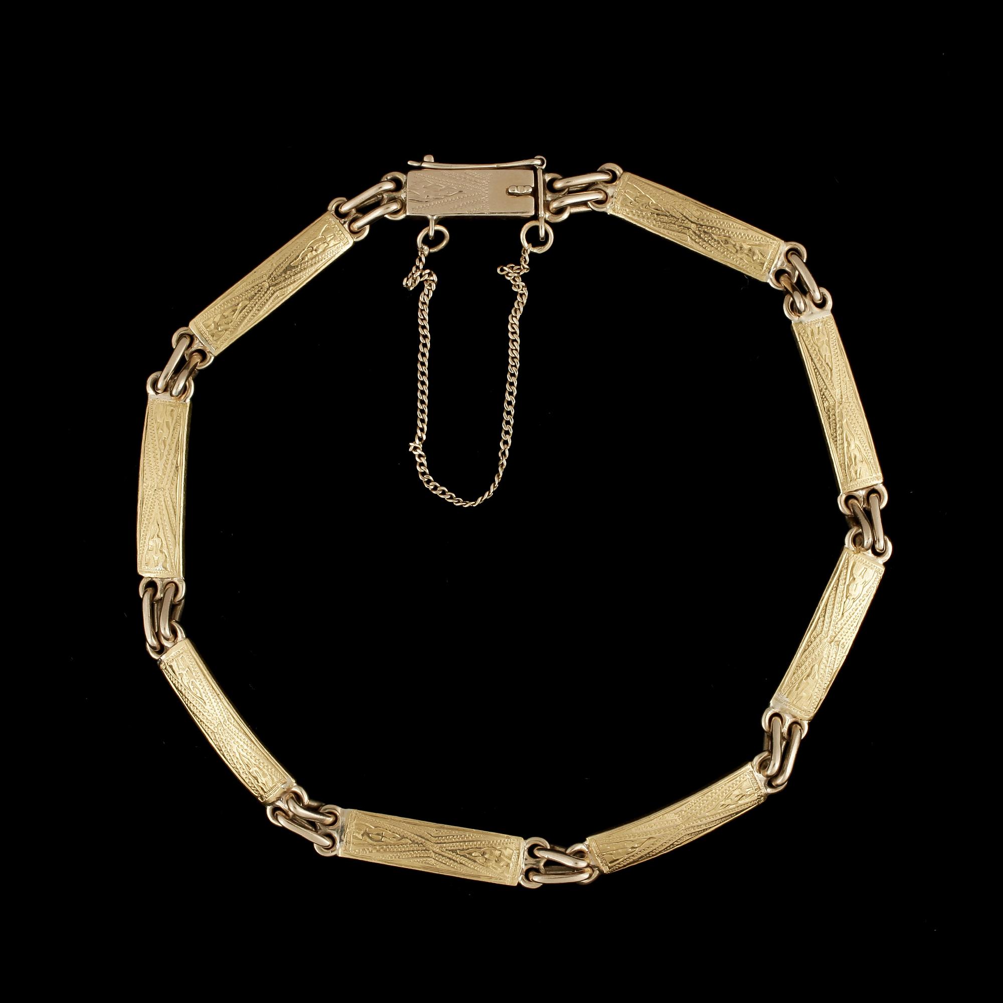 ARMBAND, 18 och 23 k guld. Vikt ca 13 g.
