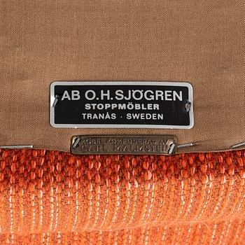 Carl Malmsten, a pair of "Farmor" armchairs, O.H.Sjögren, Sweden, later part of the 20th century.