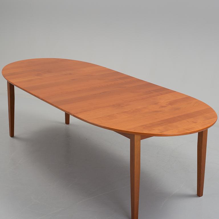 A circa year 2000 dining table.