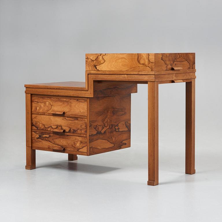 A Carl Hörvik modernist palisander desk by Nordiska Kompaniet for the 1930 Stockholm Exhibition, Sweden.