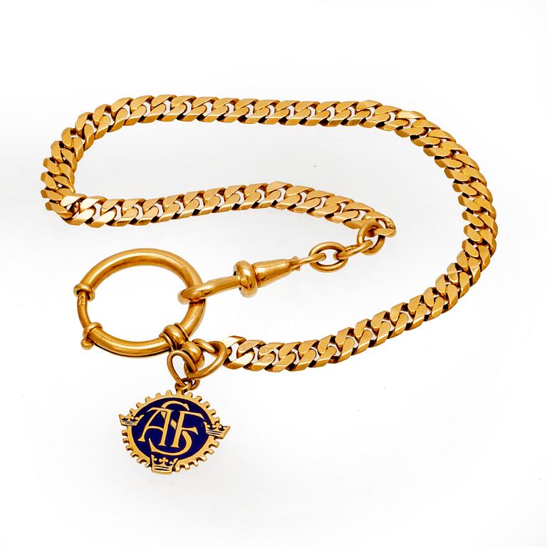 An 18K gold watch chain.