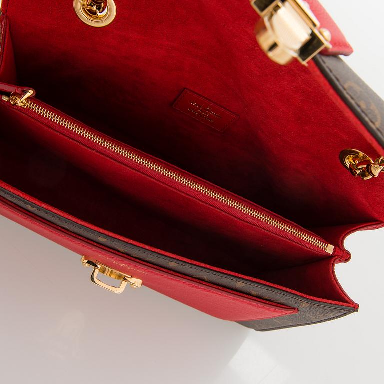 LOUIS VUITTON, A Monogram 'Victoire' Bag.